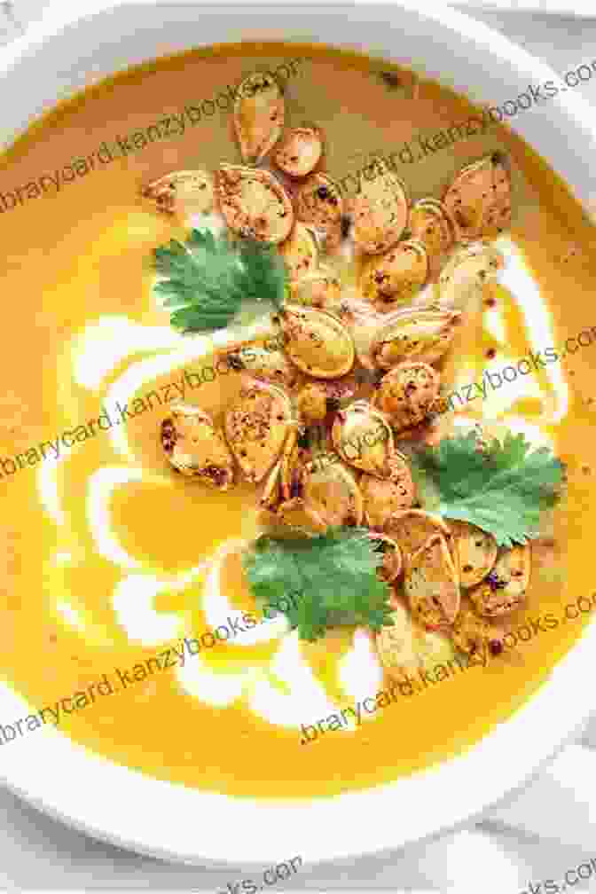 A Creamy Pumpkin Soup Garnished With Pumpkin Seeds Pumpkin Recipes: Tasty And Healthy Dishes